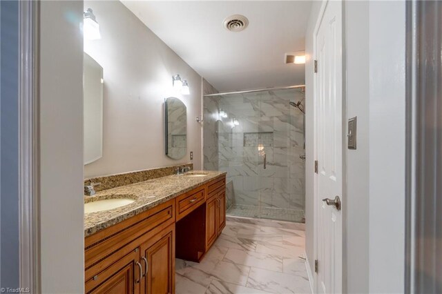 4905 Deer Pointe Ct, Greensboro, NC 27406 - full bath featuring marble finish floor, visible vents, a sink, and a marble finish shower