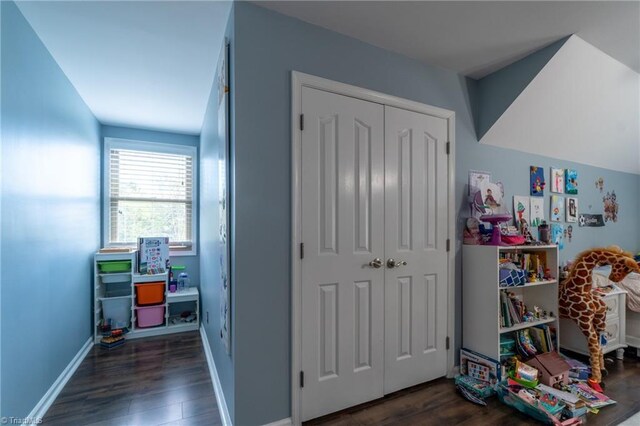 4905 Deer Pointe Ct, Greensboro, NC 27406 - playroom with baseboards and wood finished floors