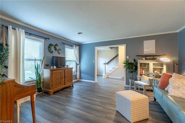 4905 Deer Pointe Ct, Greensboro, NC 27406 - living area with visible vents, ornamental molding, wood finished floors, and stairway