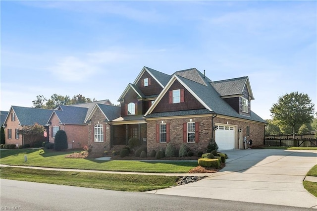 craftsman house with a front lawn and a garage