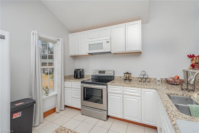 kitchen with stainless steel electric range, white cabinetry, sink, and vaulted ceiling