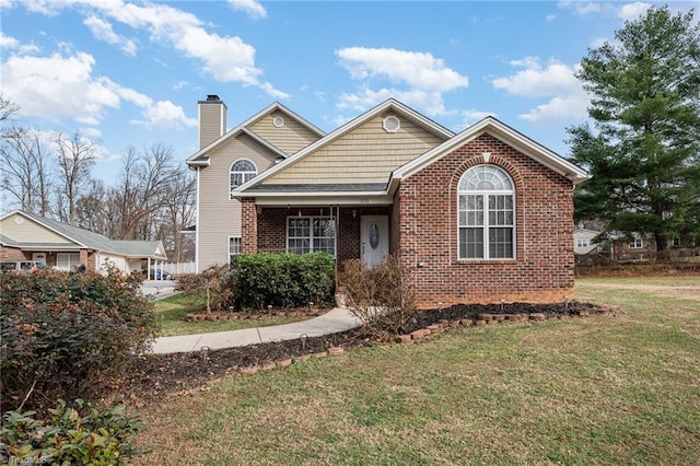 view of front of home with a front yard