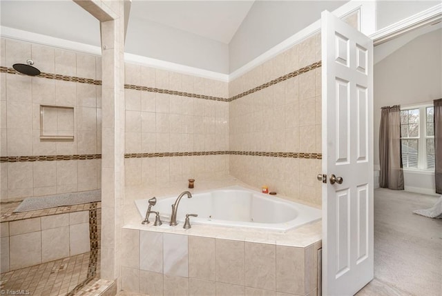 bathroom with separate shower and tub and lofted ceiling