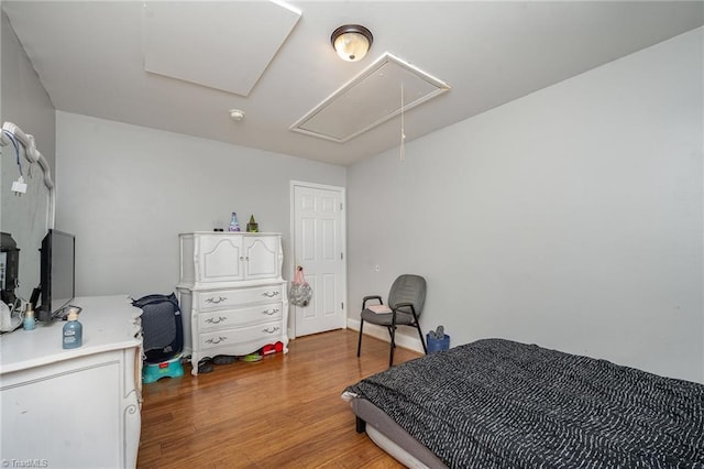 bedroom featuring hardwood / wood-style flooring