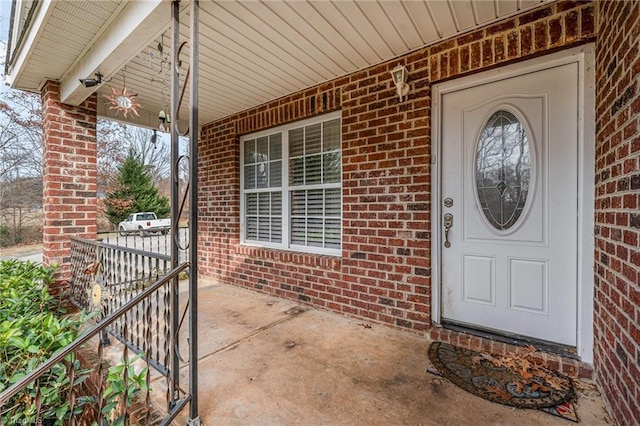 property entrance with a porch