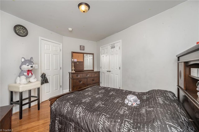 bedroom with wood-type flooring