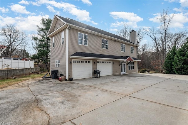 exterior space with a garage