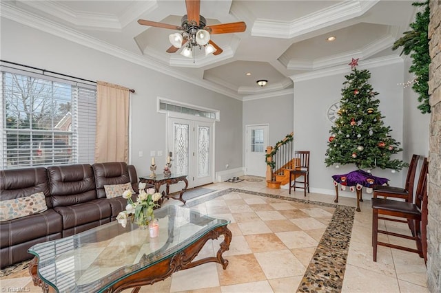 tiled living room featuring ceiling fan, a high ceiling, coffered ceiling, and ornamental molding