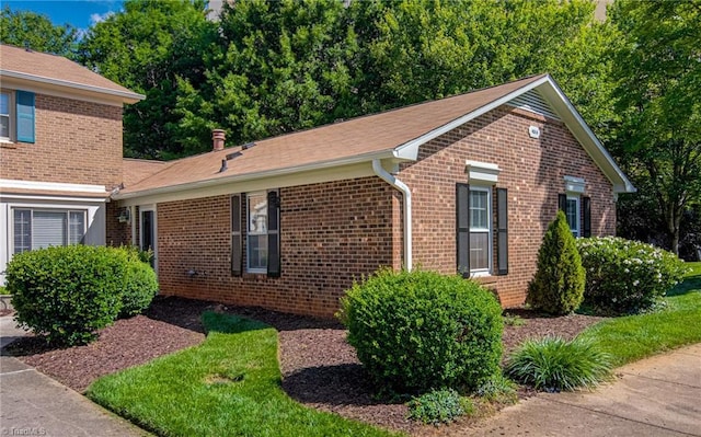 4814 Tower Rd, Greensboro, NC 27410 - view of property exterior with brick siding