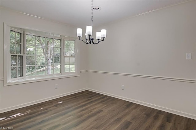 4814 Tower Rd, Greensboro, NC 27410 - empty room with a chandelier, dark wood finished floors, baseboards, and crown molding
