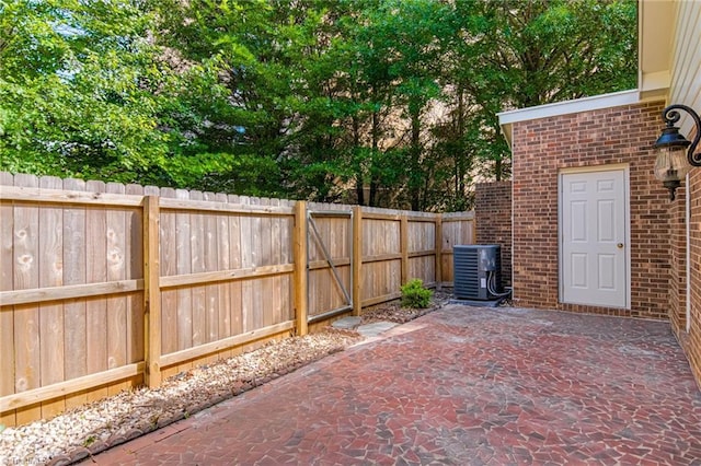 4814 Tower Rd, Greensboro, NC 27410 - fenced backyard with a patio area and cooling unit
