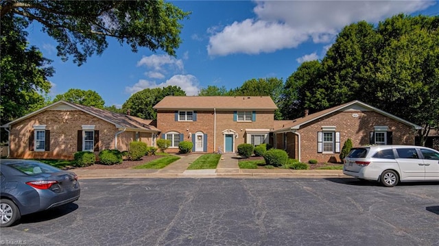 4814 Tower Rd, Greensboro, NC 27410 - colonial house with brick siding