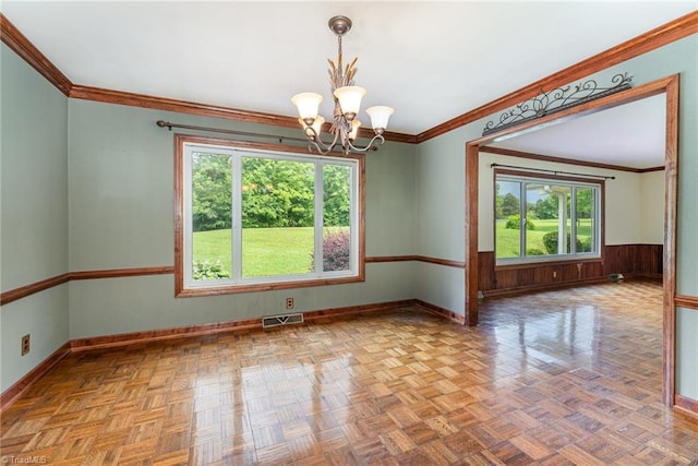 657 Spring St, Walnut Cove, NC 27052 - spare room featuring a chandelier, baseboards, wainscoting, and ornamental molding