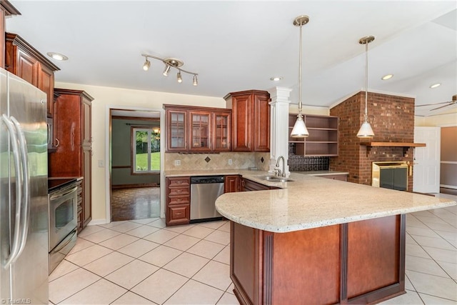 657 Spring St, Walnut Cove, NC 27052 - kitchen with stainless steel appliances, a sink, light tile patterned floors, a peninsula, and recessed lighting