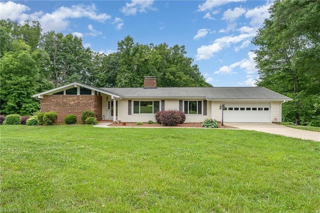 657 Spring St, Walnut Cove, NC 27052 - view of front of property with a garage, driveway, a front lawn, and a chimney