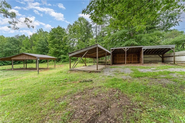 657 Spring St, Walnut Cove, NC 27052 - view of yard featuring a carport