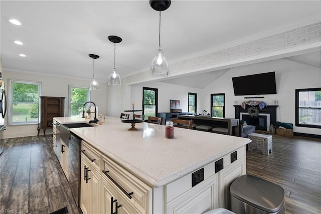 5706 Windworth Dr, Winston-Salem, NC 27106 - kitchen with a center island with sink, dark wood-type flooring, dishwasher, hanging light fixtures, and crown molding