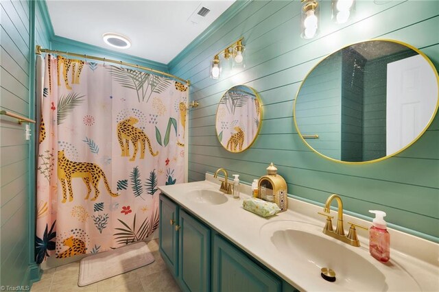 5706 Windworth Dr, Winston-Salem, NC 27106 - bathroom with double vanity, wooden walls, a shower with curtain, and tile patterned flooring