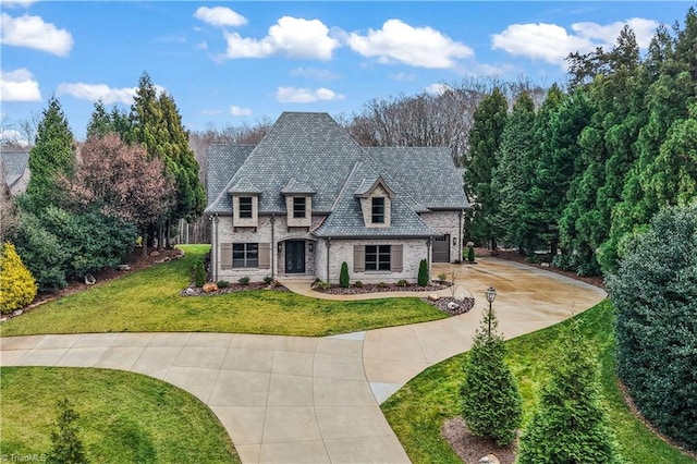 view of front of home with a front yard