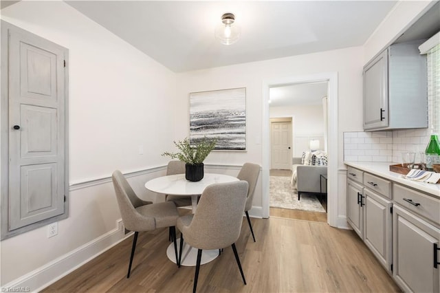 252 Lucerne Ln NW, Winston-Salem, NC 27104 - dining room with light wood-type flooring and baseboards