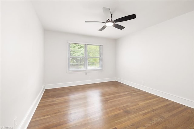 252 Lucerne Ln NW, Winston-Salem, NC 27104 - spare room with baseboards, wood finished floors, and a ceiling fan