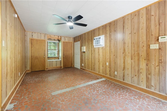 252 Lucerne Ln NW, Winston-Salem, NC 27104 - unfurnished room featuring wooden walls, ceiling fan, baseboards, and a wall mounted air conditioner