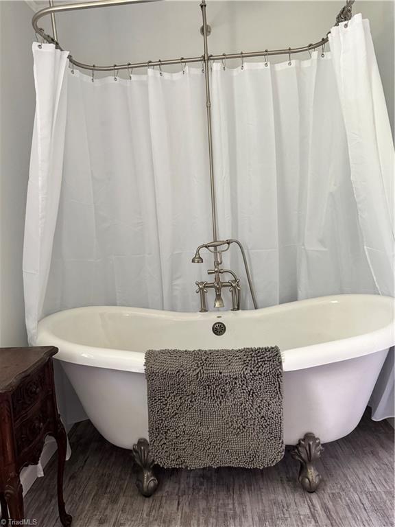 2226/2234 NC-268, Pilot Mountain, NC 27041 - full bathroom with wood finished floors and a soaking tub