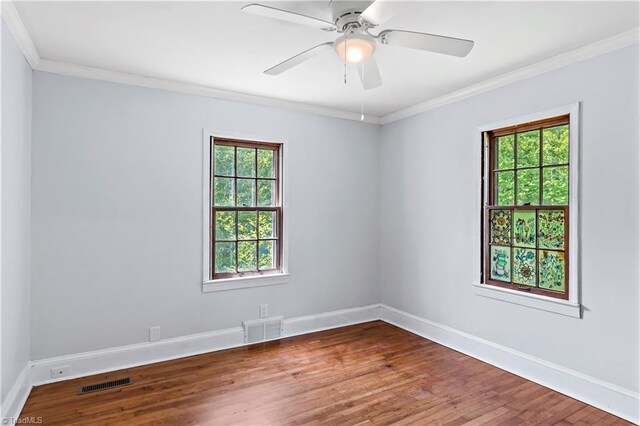 2226/2234 NC-268, Pilot Mountain, NC 27041 - spare room with baseboards, wood finished floors, ornamental molding, and ceiling fan
