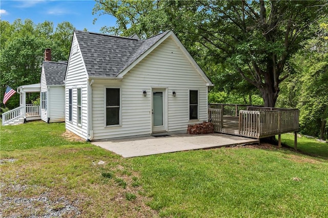 2226/2234 NC-268, Pilot Mountain, NC 27041 - back of house with a shingled roof, a yard, a patio, a deck, and a chimney
