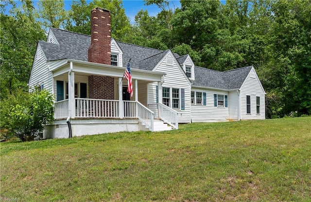 2226/2234 NC-268, Pilot Mountain, NC 27041 - cape cod house featuring a shingled roof, a chimney, covered porch, and a front lawn