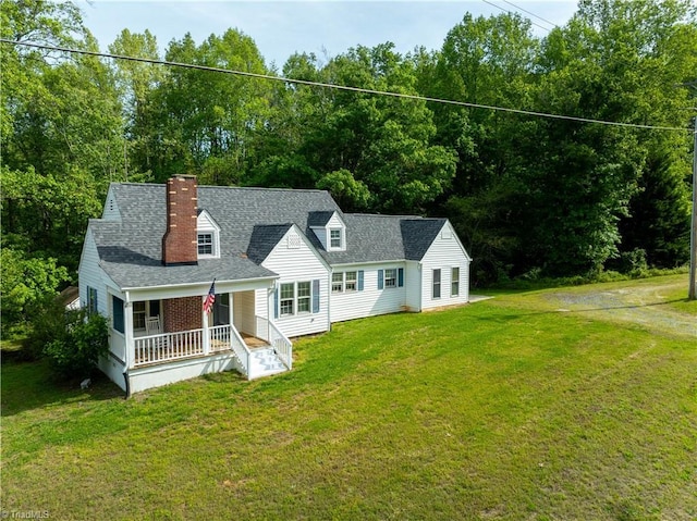 2226/2234 NC-268, Pilot Mountain, NC 27041 - cape cod-style house with covered porch, a front yard, a shingled roof, and a chimney