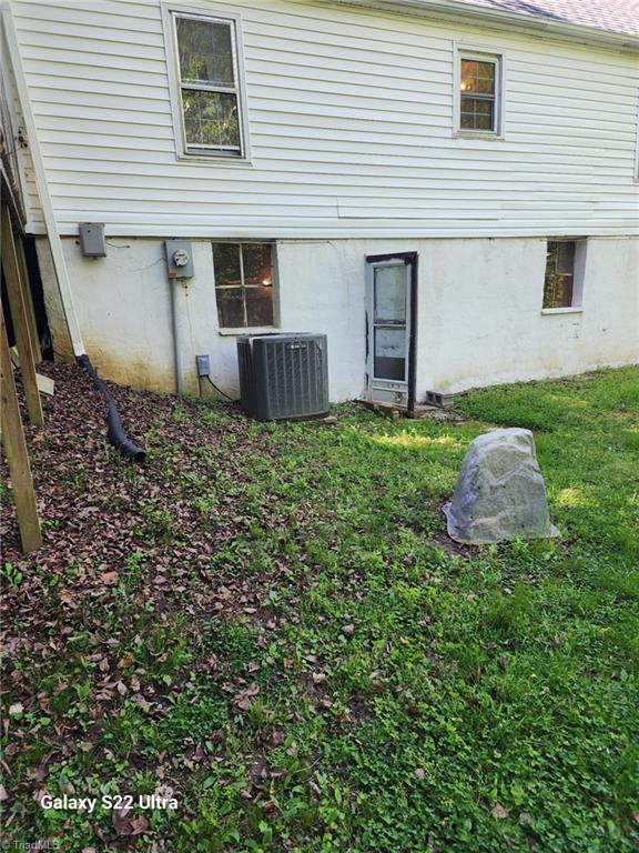 2226/2234 NC-268, Pilot Mountain, NC 27041 - back of property with central AC and a yard