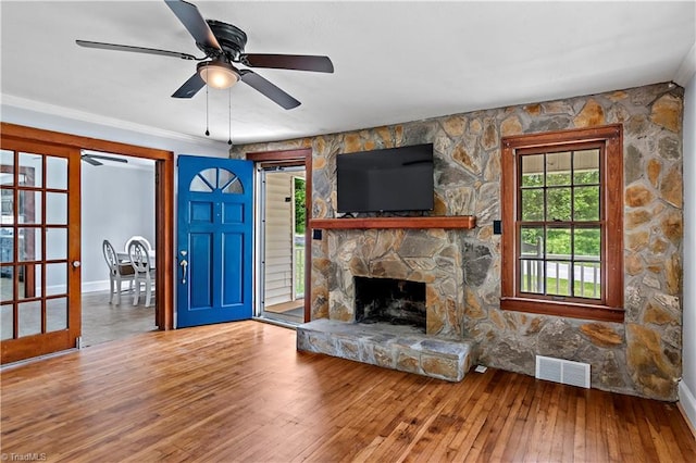 2226/2234 NC-268, Pilot Mountain, NC 27041 - unfurnished living room with wood-type flooring, a ceiling fan, a fireplace, and baseboards