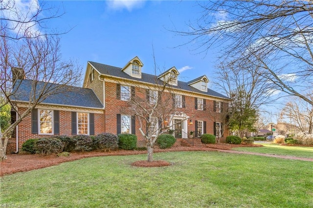 colonial home with a front yard