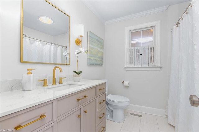 bathroom featuring vanity, toilet, and ornamental molding