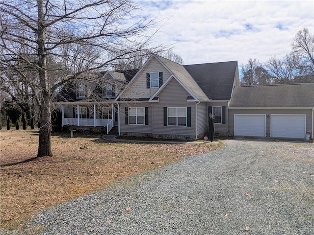 view of front of house featuring an attached garage, a porch, crawl space, and gravel driveway