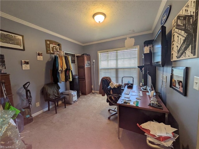 office space featuring baseboards, ornamental molding, a textured ceiling, and light colored carpet