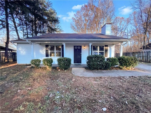 single story home with covered porch