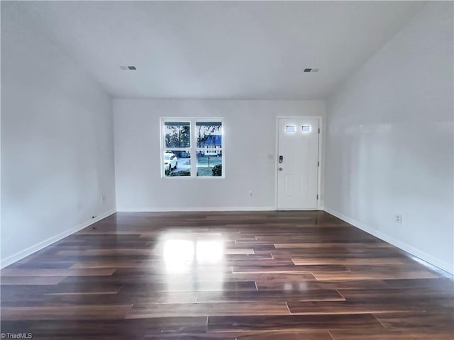 entryway with dark hardwood / wood-style floors