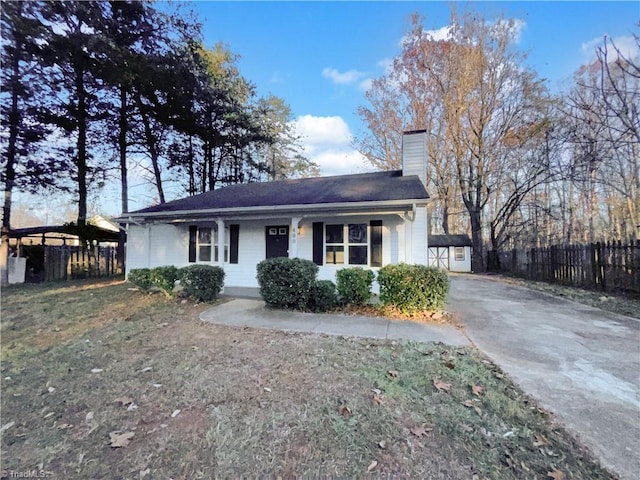 view of front facade with an outbuilding