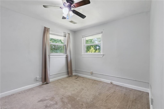 1402 Wendell Ave, High Point, NC 27260 - carpeted empty room with a ceiling fan and baseboards