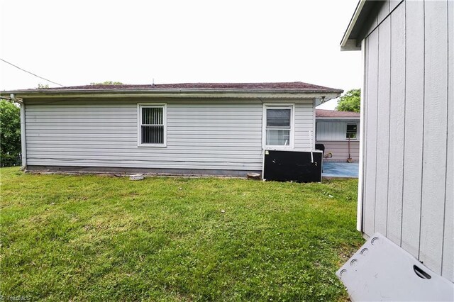 1402 Wendell Ave, High Point, NC 27260 - view of home's exterior with a yard