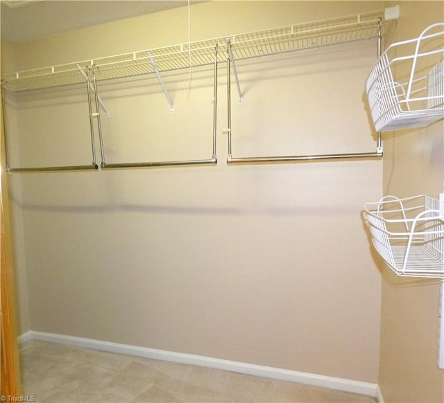 3982 Westridge Meadow Cir, Clemmons, NC 27012 - walk in closet featuring carpet floors