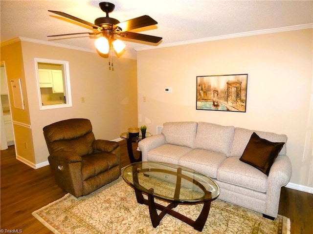 3982 Westridge Meadow Cir, Clemmons, NC 27012 - living area featuring wood finished floors, ceiling fan, baseboards, ornamental molding, and a textured ceiling