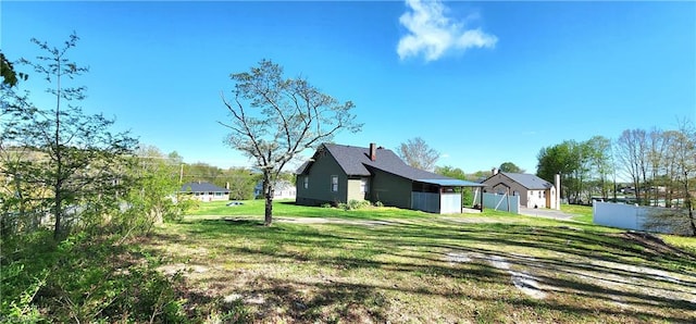 view of property exterior featuring a yard