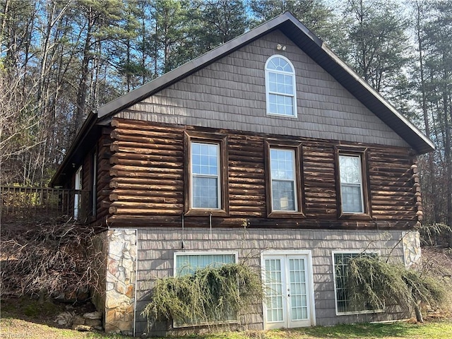 view of home's exterior featuring french doors