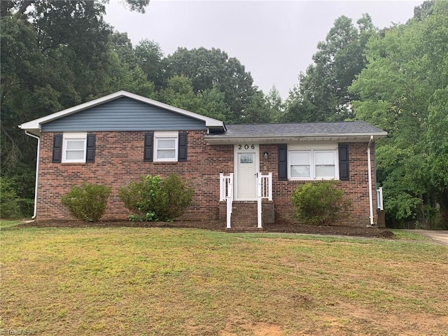 view of front of property with a front lawn