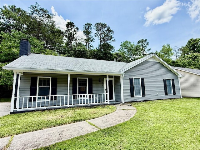 1808 Rivertrace Pt, High Point, NC 27265 - single story home featuring a porch, a front yard, and a chimney