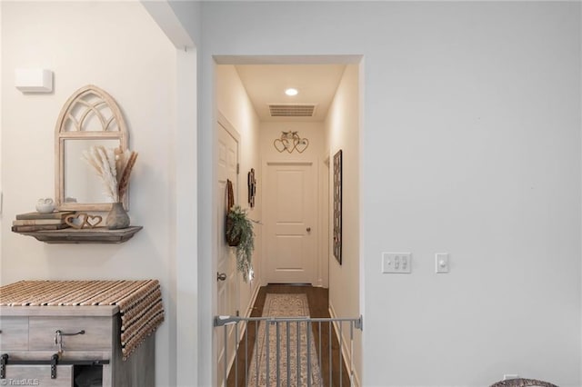 hallway featuring visible vents