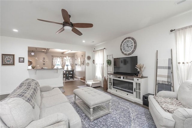 living room with ceiling fan, baseboards, wood finished floors, and recessed lighting